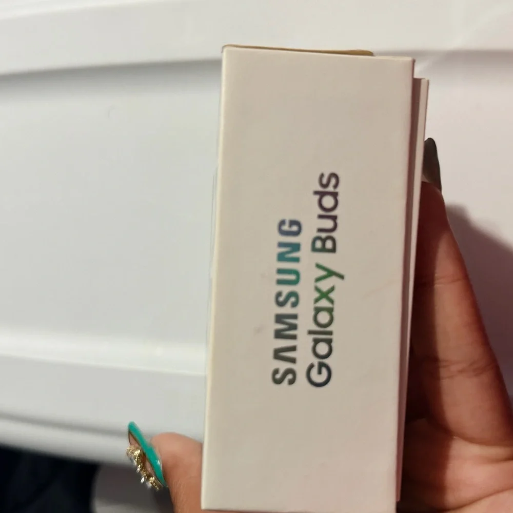 Samsung Galaxy Buds with White and Green Accents